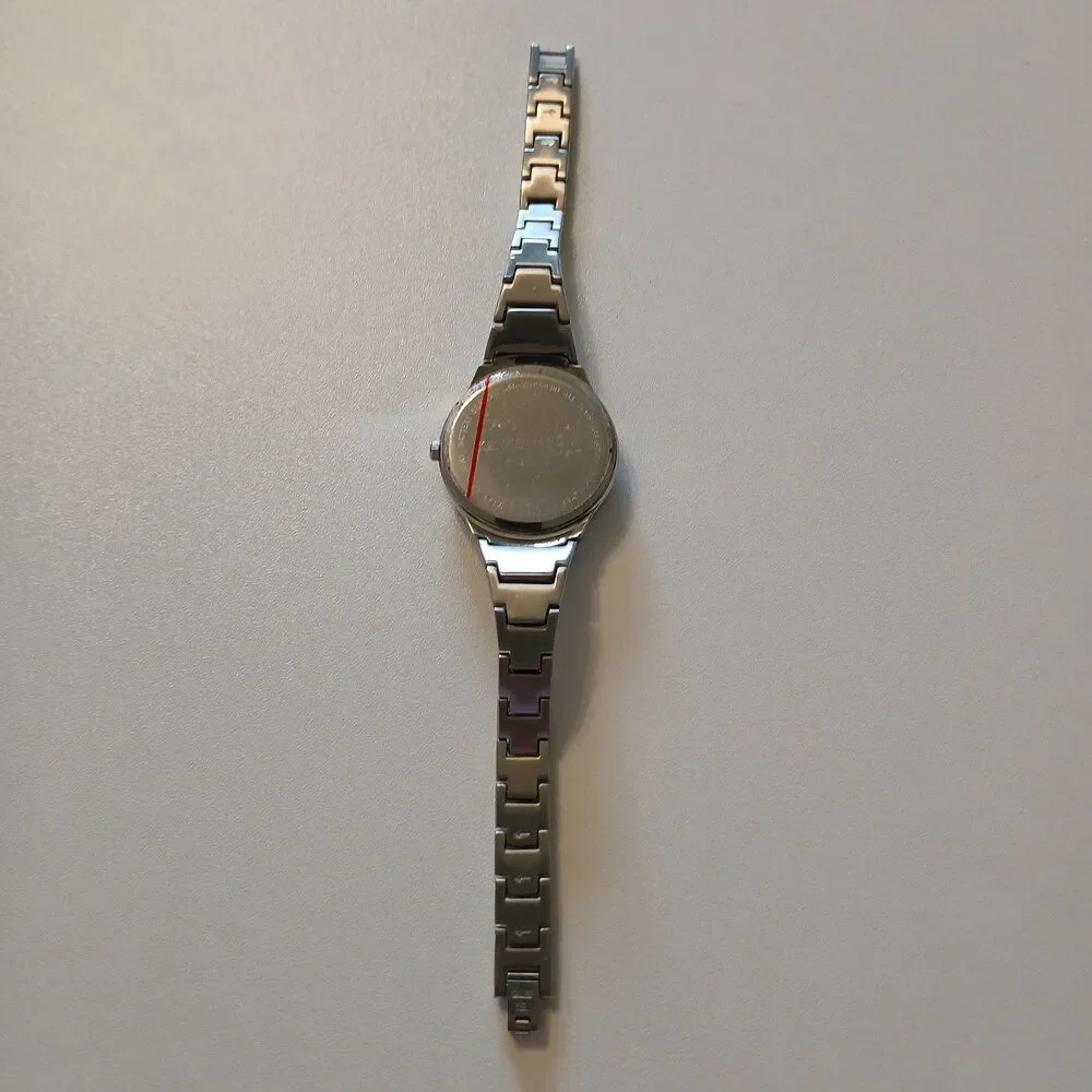 Kenneth Cole New York KC4381 Stainless Steel Women Watch Gray Textured Dial 31mm